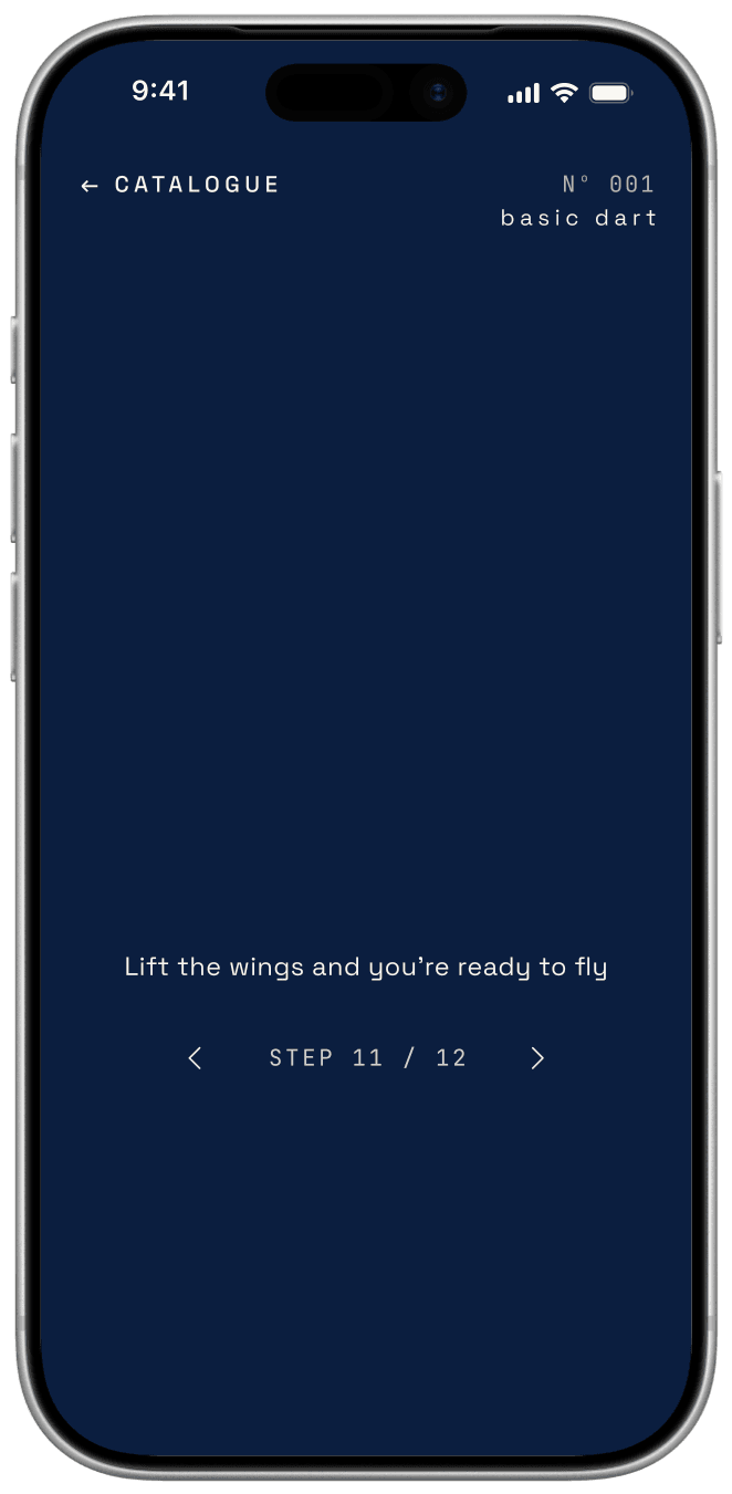 A phone showing a folding blueprint for a basic paper dart.